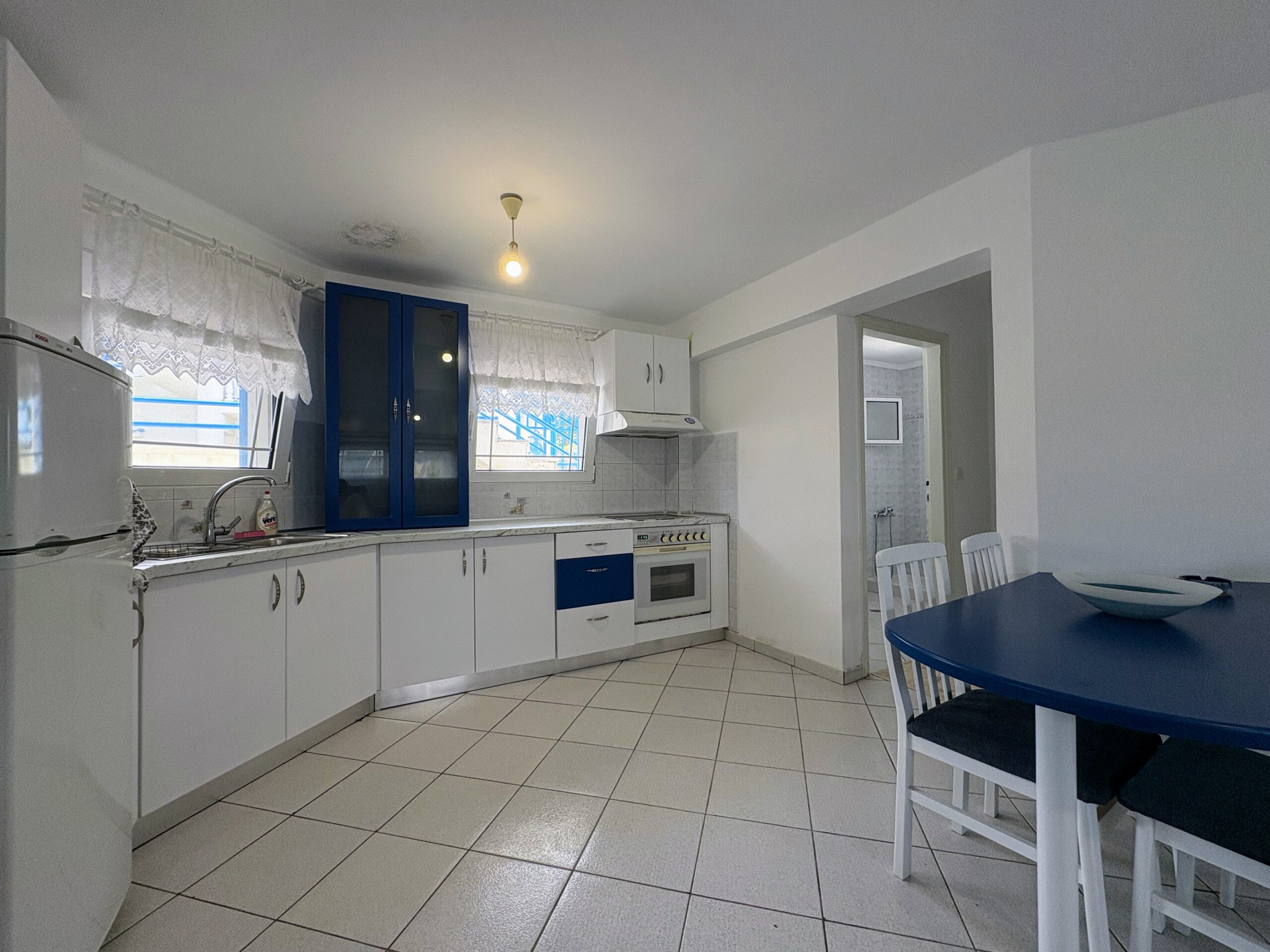 Themis Beachfront Apartment 5 Argo Rentals - Themis Apartment - Dining area & Kitchen - Fully Equipped