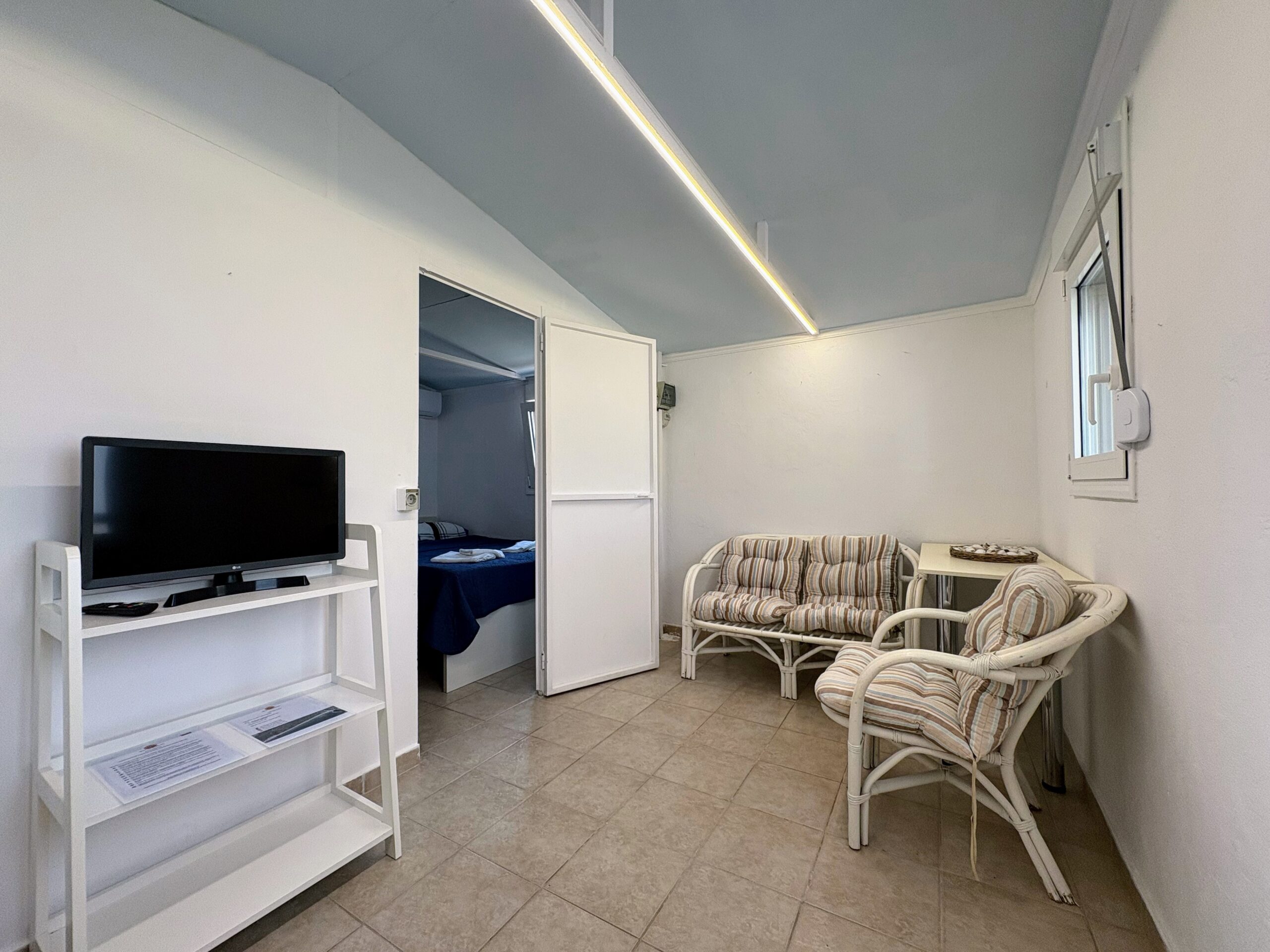 Pantelis 8 Argo Rentals - Golden Fleece Bungalow - Living room & TV